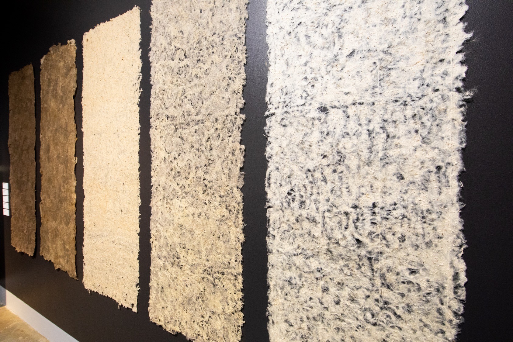 Hanging panels of paper made from thistle fibre