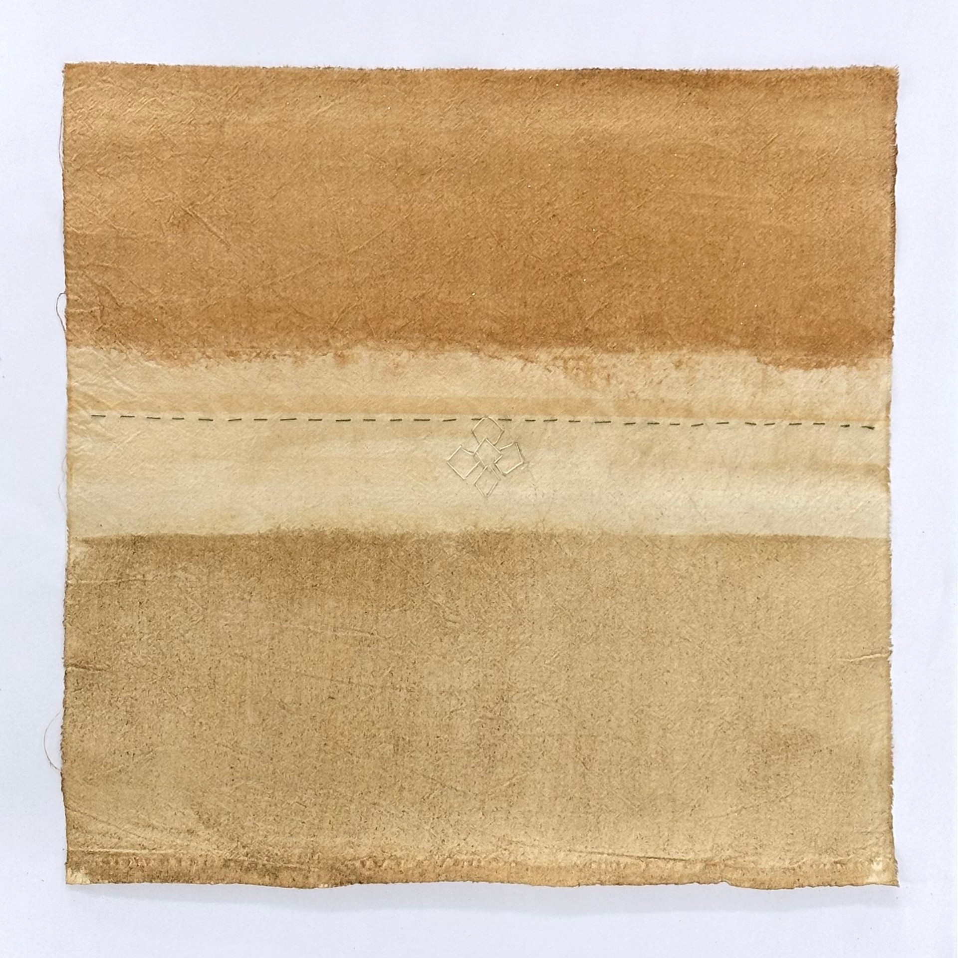 Unstretched canvas in warm ochres with dashed stitching