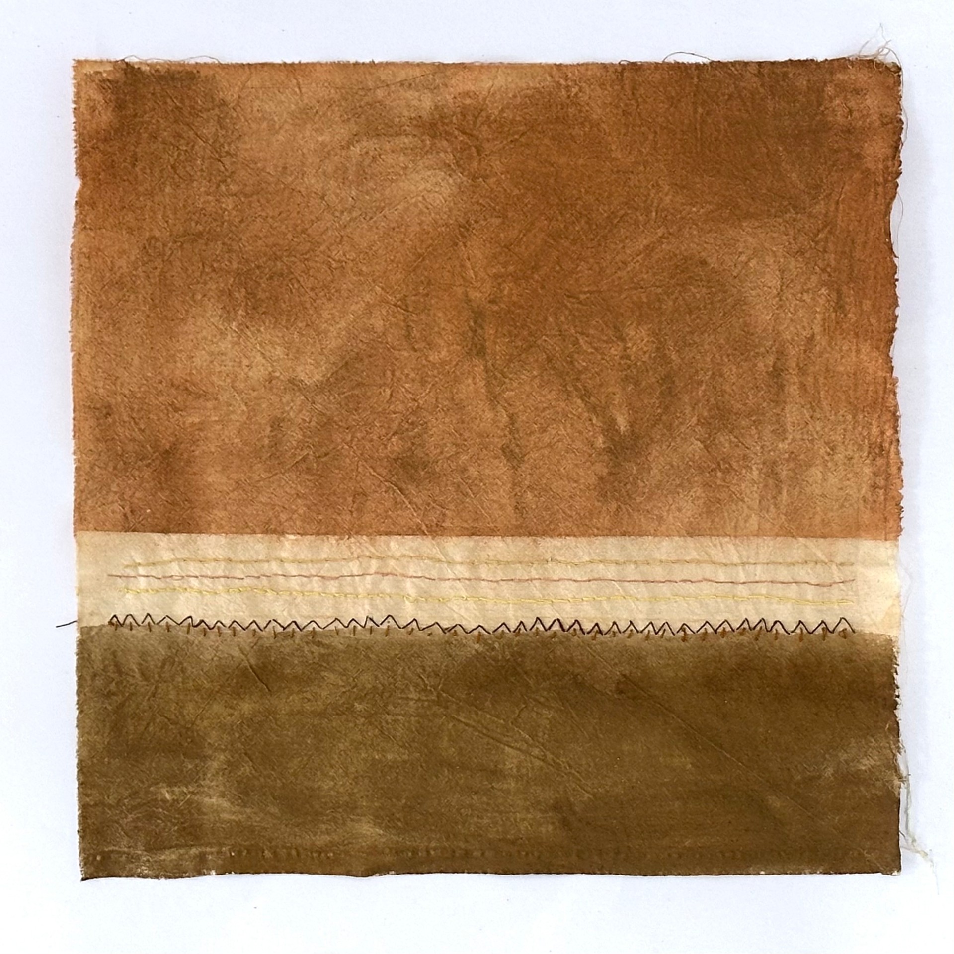 Unstretched canvas with terracotta and olive fields