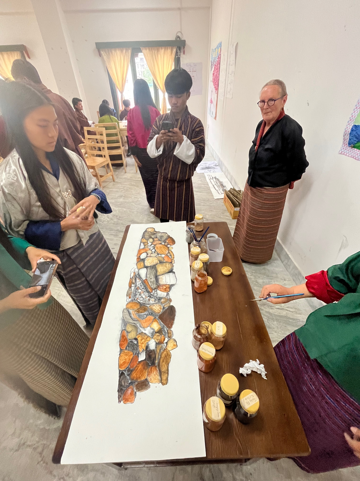 Local pigments and stones displayed with artists